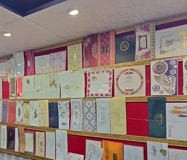 Wedding card samples on our counter wall